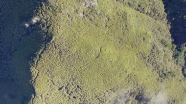 Amazing mythical aerial view over the rainforest on the volcanic island of Madeira in the Atlantic Ocean in 4K.