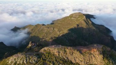 Breathtaking aerial footage of a wonderful sunset on the highest mountain in Madeira, Pico Ruivo, in 4K.