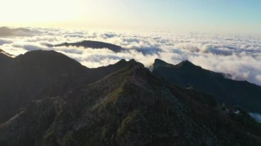 Great aerial shots during a scenic flight around Pico Ruivo on Madeira in Portugal, a volcanic island in the Atlantic Ocean captured in 4K.