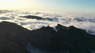 Great aerial shots during a scenic flight around Pico Ruivo on Madeira in Portugal, a volcanic island in the Atlantic Ocean captured in 4K.