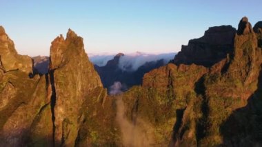 Great aerial footage in 4K of a sunrise in the mountains of Madeira taken with a drone.