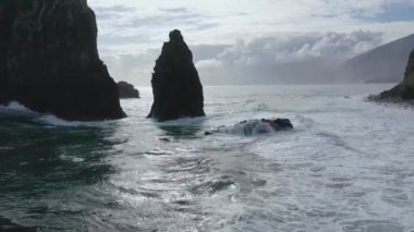 Amazing 4K aerial footage off the coast of Madeira from the Atlantic Ocean taken with a drone from a bird's eye view. Big waves.