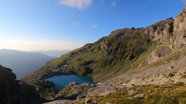 Amazing time lapse at a beautiful alpine lake in the alps of Switzerland. Wonderful video in 4K at an amazing region called Pizol at sunset.