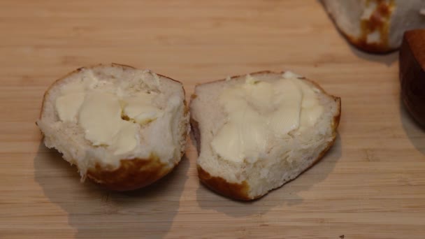 Piece Salami Placed Lye Bread Smeared Butter — Stock video