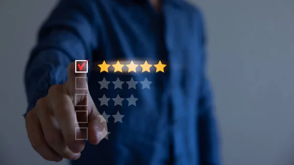 Customer service best business rating. Development and create satisfaction for customers in the future. Businessman using a finger point touch chooses the best satisfaction 5 stars.