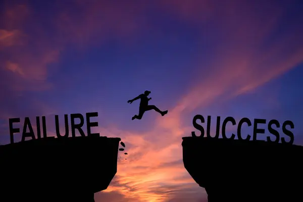 Man jump across text failure to success over cliff on sunset background concept for being successful in job and business.