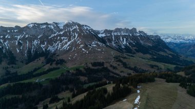 Breathtaking sunrise illuminating the peaks of bishorn, located in the swiss alps at 4000 meters elevation stunning natural beauty captured in a serene mountain landscape clipart