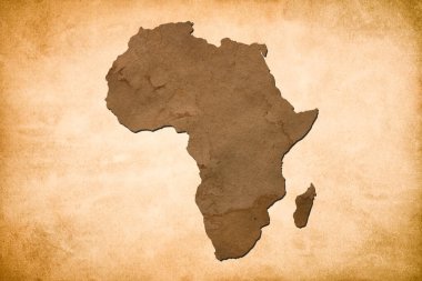 Afrika kıtasının haritasında yıpranmış kahverengi deri parşömen üzerinde su lekesi izi var. Afrika kıtasının klasik tarihi haritası.