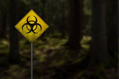 Radioactive biohazard pollution. Yellow warning sign with hazard symbol near contaminated area in forest clipart