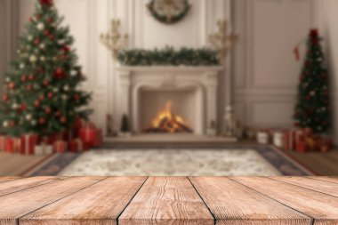 Ürün görüntüleme montajı için odak dışı noel ağacı olan boş noel masası arkaplanı