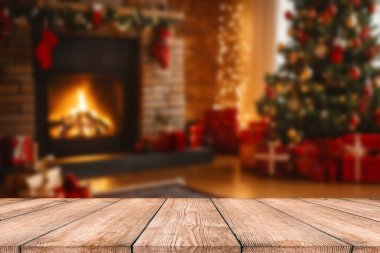 Ürün görüntüleme montajı için odak dışı noel ağacı olan boş noel masası arkaplanı