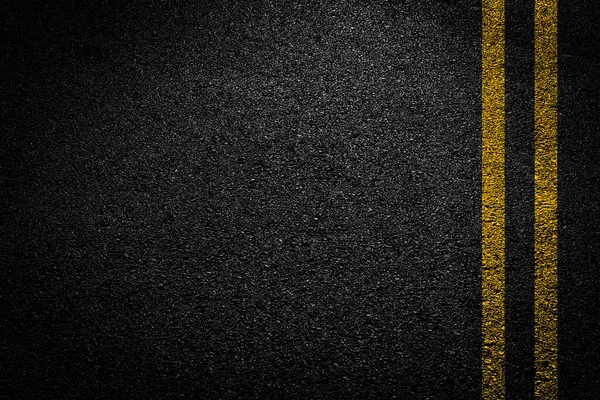 Çift Sarı çizgi üzerinde yeni asfalt yol doku arka plan
