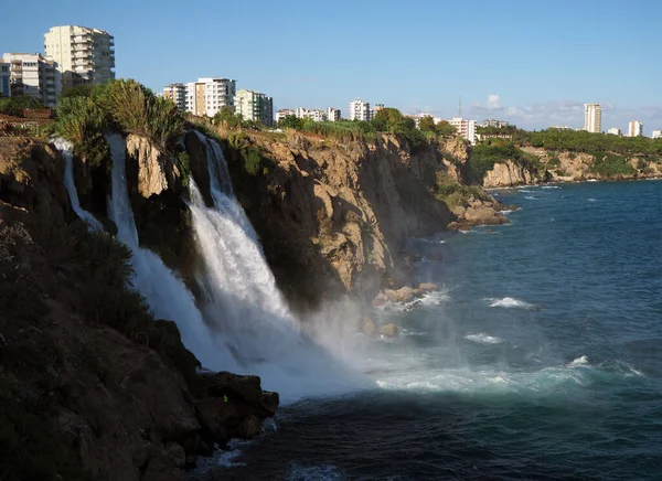 stock image The cliffs where the duden river flows into the sea. Waterfall Duden at Antalya, Turkiye. 