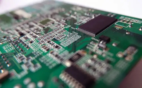 stock image Microchip on the electronic circuit board. High technology electronic components. 