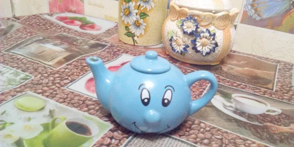 Tea kettle. A teapot on the table