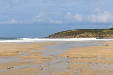 Waves on Nemina beach flooding the sand with the rising tide, Muxia, Galicia, Spain clipart