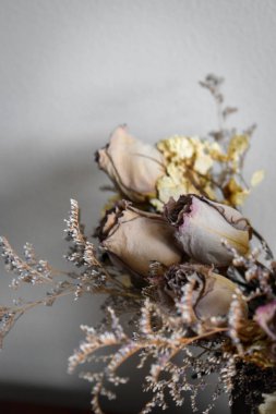 Decorative dried lavender bouquet against a white background