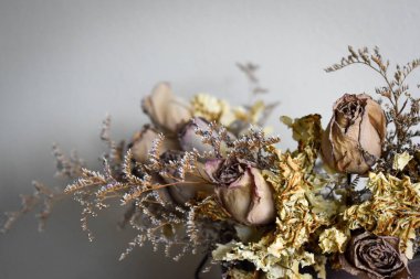 Decorative dried lavender bouquet against a white background