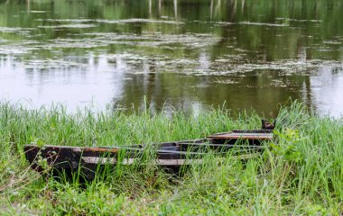 Wooden boats pulled to the shore of the National Park - Sodros.