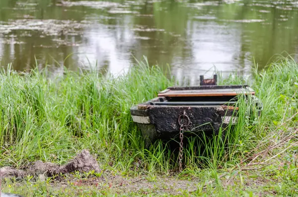 Wooden boats pulled to the shore of the National Park - Sodros.
