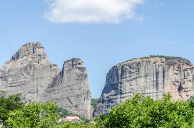 Panoramic view of Mount Meteora from the city of Kalambaka in Greece. clipart