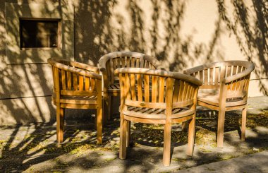 Pecs, Hungary - October 06, 2018: Wooden chairs in the restaurant in Pecs, Hungary.