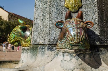 Pecs, Hungary - October 06, 2018: Cityscape on main city Square of Pecs - Hungary. Zsolnay fountain landmark Pecs. Zsolnay manufactured sculptures on a fountain in the main square in Pecs Hungary