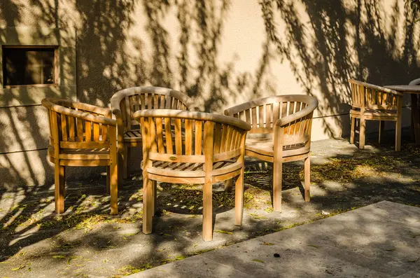 Pecs, Hungary - October 06, 2018: Wooden chairs in the restaurant in Pecs, Hungary.