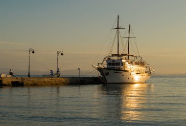 Sunrise over the small tourist town of Pefkochori, Greece in the early morning hours.