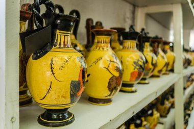 Kalambaka, Greece - June 10, 2018: A look at the exhibited items of a local shop in the city of Kalambaka in Greece.