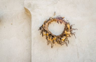 Traditional view of Serbia: Braided Wreath of flowers above the door.