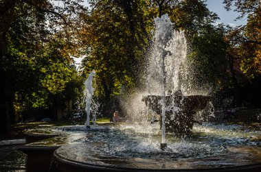 Pecs, Hungary - October 06, 2018: The fountain in the city park Pecs, Hungary, in the fall.