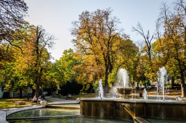 Pecs, Hungary - October 06, 2018: The fountain in the city park Pecs, Hungary, in the fall.