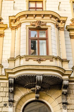 Pecs, Hungary - October 06, 2018: Windows with decorative baroque facades in the center of Pecs, Hungary