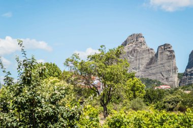 Panoramic view of Mount Meteora from the city of Kalambaka in Greece. clipart