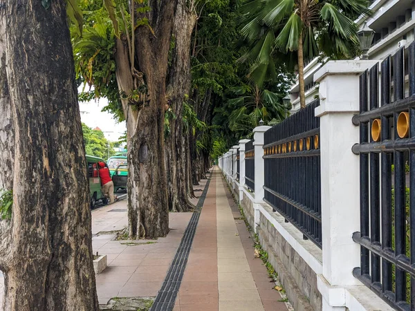 A sidewalk for pedestrians in surabaya, indonesia. No people