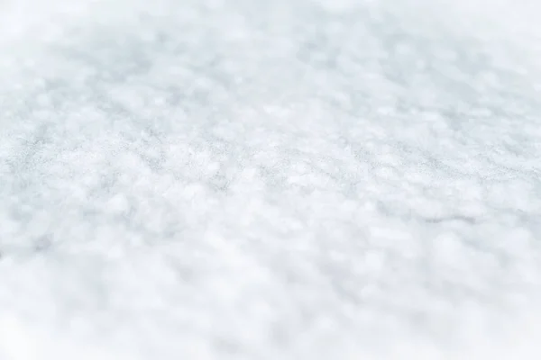 Snow texture top view of snow.White snow texture. Snowflakes.Winter snow.Texture for design.Fresh snow background.Seamless background of white snow.