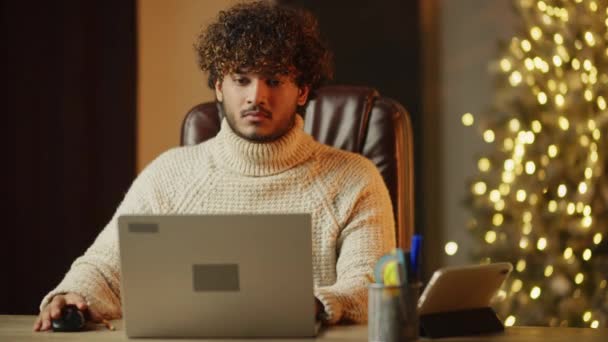 Freelancer Working Christmas Young Man Sweater Using Laptop Xmas Tree — Video Stock