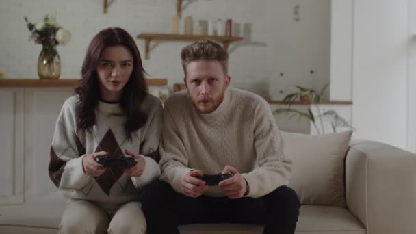 Front View Couple Playing Video Games Home Bearded Man Controller — Vídeo de stock