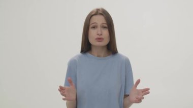 An excited woman crosses her fingers and then gets upset that her hopes were not met. Close-up of a frustrated woman whose hopes were not fulfilled. High quality 4k footage