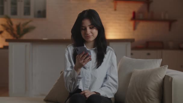 Smiling Brunette Girl Browsing Social Media Feed Her Smartphone Woman — Vídeo de Stock