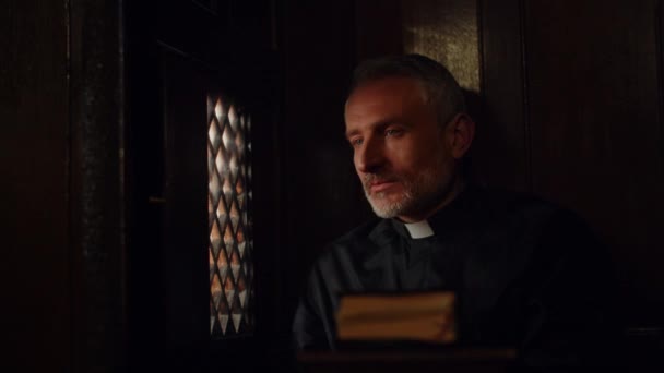 Pastor Listening Someones Confession Confessional Booth Nodding Understanding Catholic Priest — Stock video