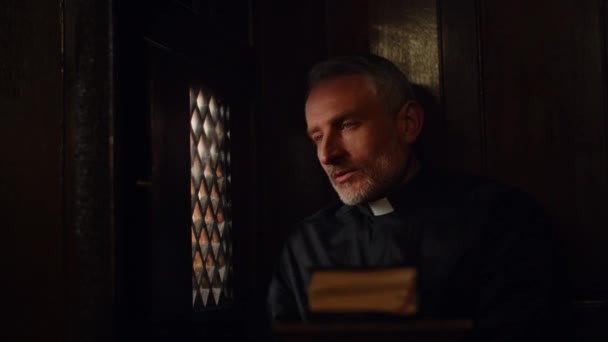 Gray Haired Pastor Opens Window Confessional Listens Attentively Parishioner Priest — Stock Video
