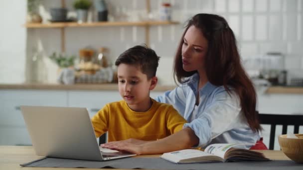 Woman Her Son Sitting Table Looking Something Laptop Beautiful Brunette — Stock Video