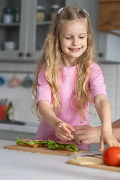 Pretty Smiling Little Girl Mistress Kitchen Helps Her Mother Make — Stock Photo, Image
