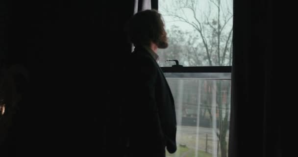Close Young Concentrated Businessman Nice Suit Looking Out Big Window — Wideo stockowe