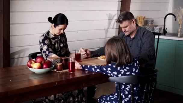 Happy Family Holding Hands Praying Closed Eyes Having Meal Caucasian — Stock Video