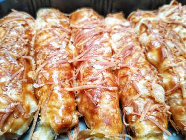 baked homemade cheese pastry on baking tray