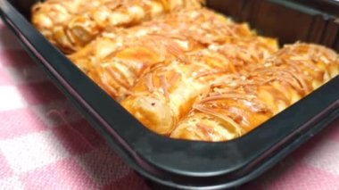 baked homemade cheese pastry on baking tray