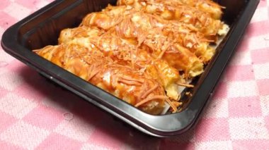 baked homemade cheese pastry on baking tray